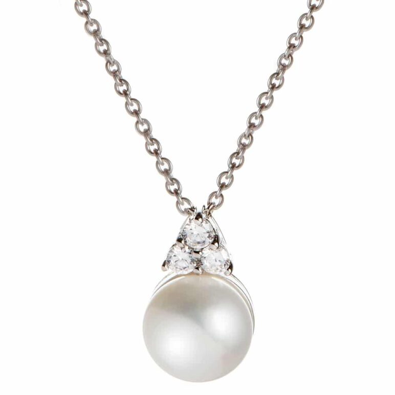 Sterling silver and freshwater pearl pendant with a trio of white topaz stones.