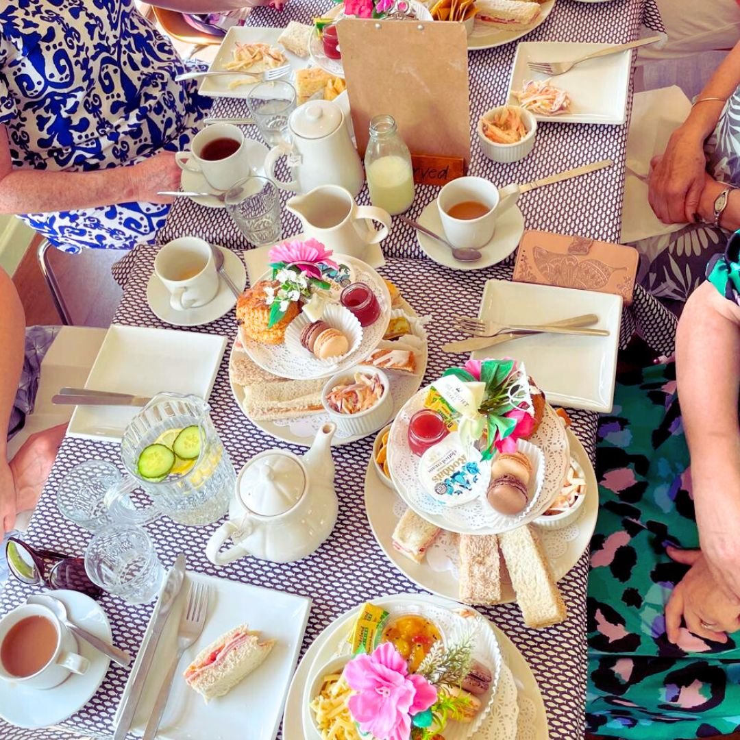 photos of table of afternoon tea plates for celebration at isle of wight pearl