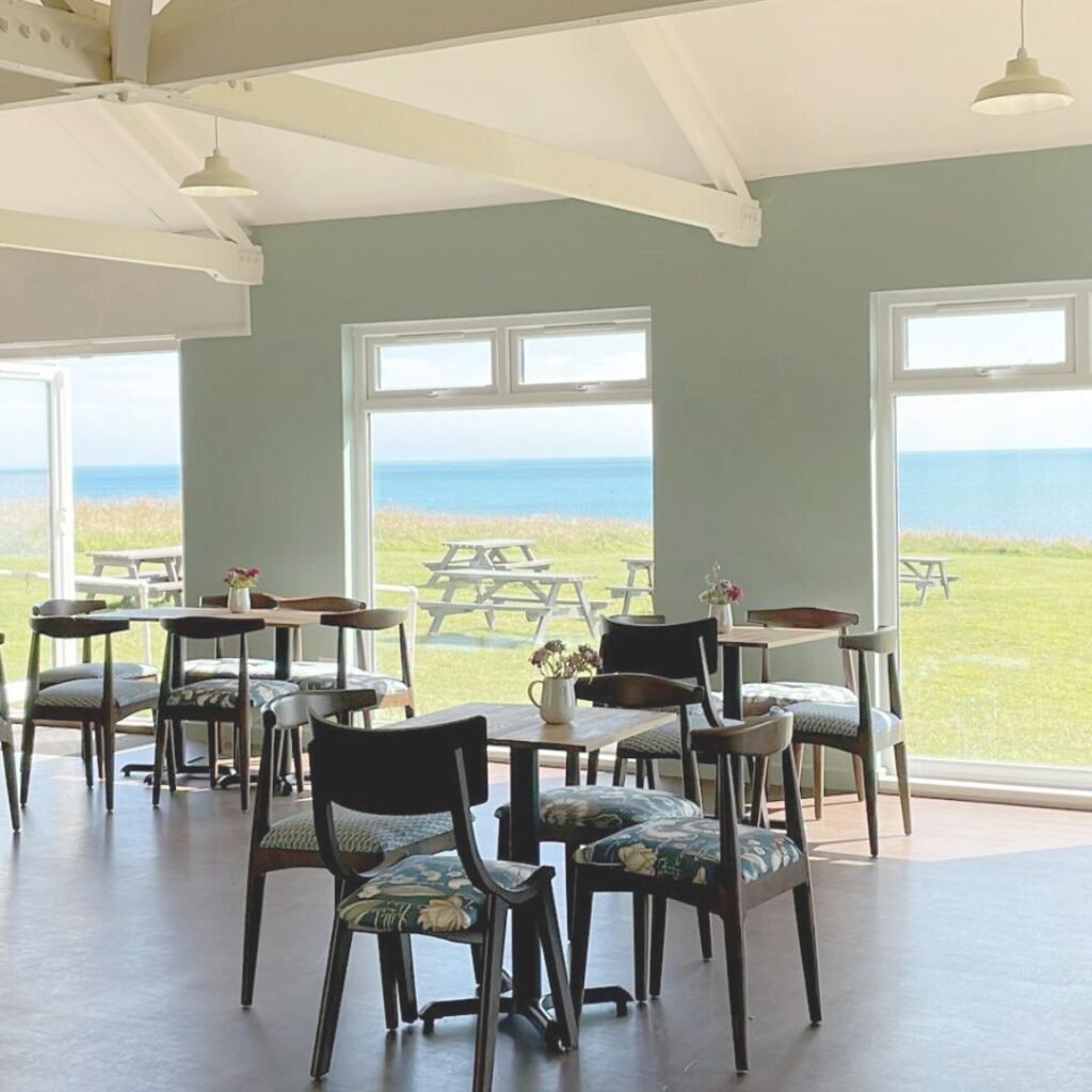 interior photo of table and chairs from the pearl cafe at isle of wight pearl