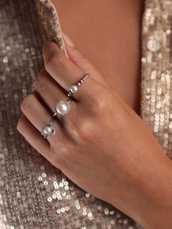 JERSEY PEARL MARETTE TAU PEARL RING WORN WITH JERSEY PEARL AMBERELY CLUSTER PEARL RING AND JERSEY PEARL COAST RING