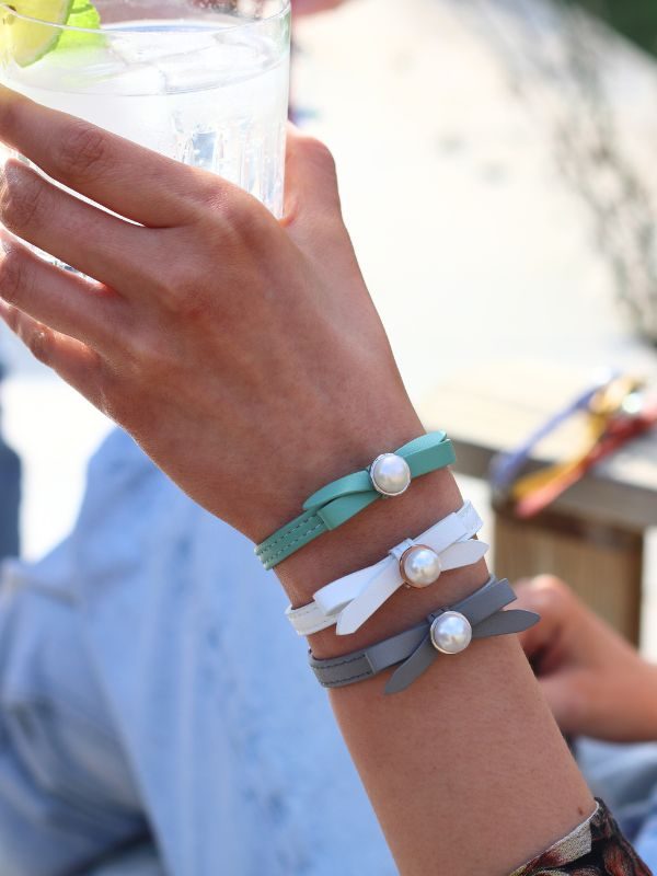three layered isle of wight pearl joli bracelets on models arm